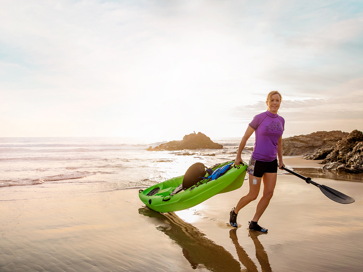Omnipod - Podder, Joy - with kayak on beach