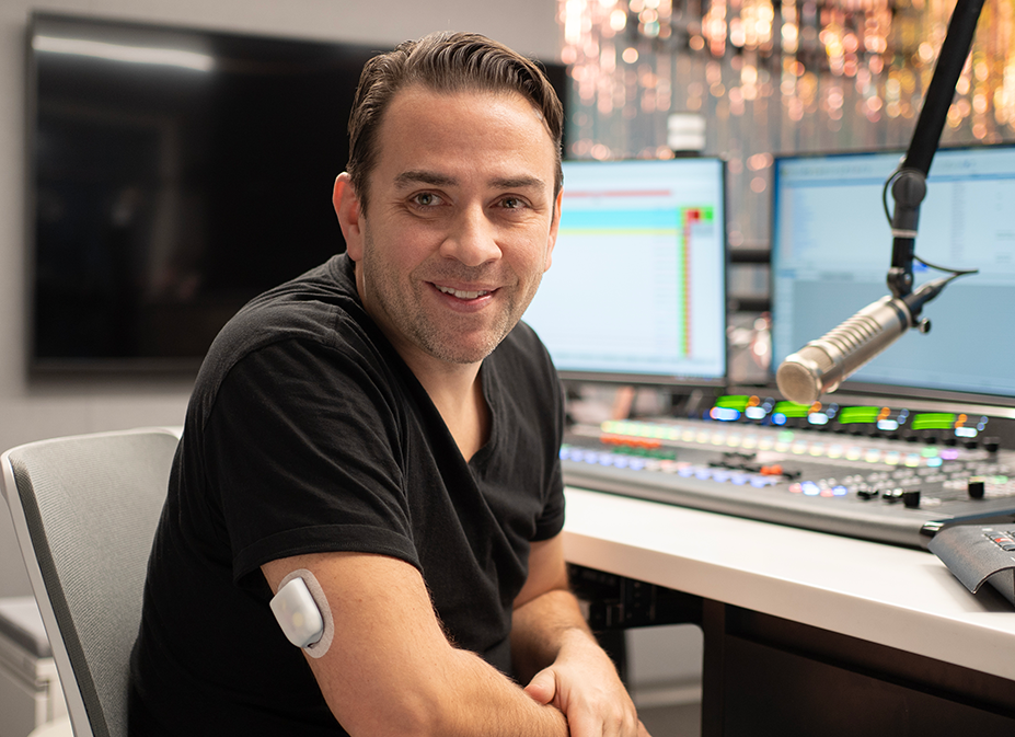 Omnipod Podder Garrett V in a studio and has a Pod on his right arm