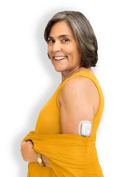Omnipod Podder wear an orange dress with a Pod on her left arm