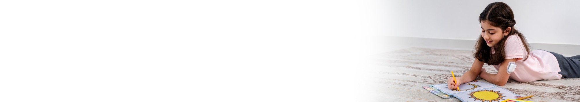 Podder, drawing in a book