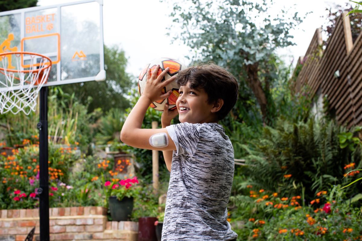 Podder playing basketball
