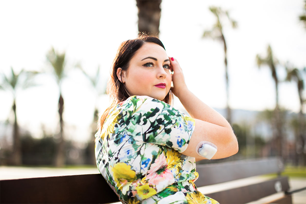 woman sitting on a bench in a park
