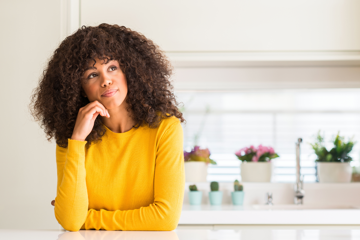 Person with diabetes thinking at a kitchen table