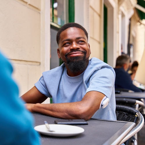 Omnipod Podder, Dan Newman, sitting outside and smiling.
